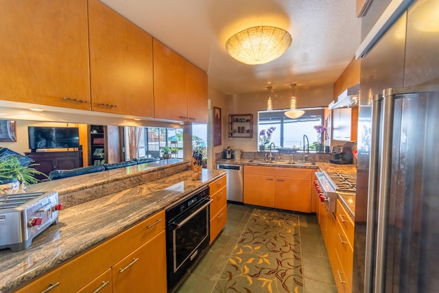 78-6928 Walua Rd, Kailua-Kona, HI 96740 - kitchen with appliances with stainless steel finishes, a sink, extractor fan, dark tile patterned floors, and open floor plan