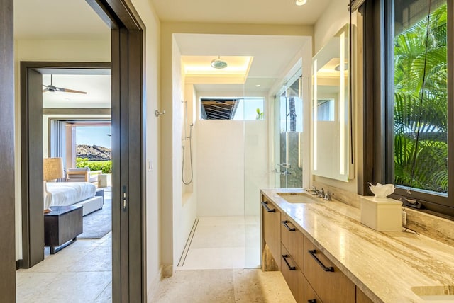 73-6250 Alani Loop Unit 12, Kailua-Kona, HI 96740 - bathroom featuring a shower, vanity, and ceiling fan