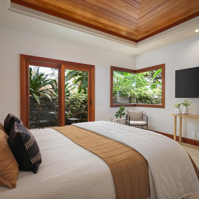 81-6641 Auamo Pl, Kealakekua, HI 96750 - bedroom featuring a raised ceiling, access to exterior, and baseboards