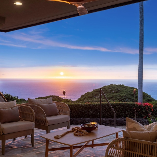 81-6641 Auamo Pl, Kealakekua, HI 96750 - view of patio / terrace with an outdoor living space with a fire pit and a water view