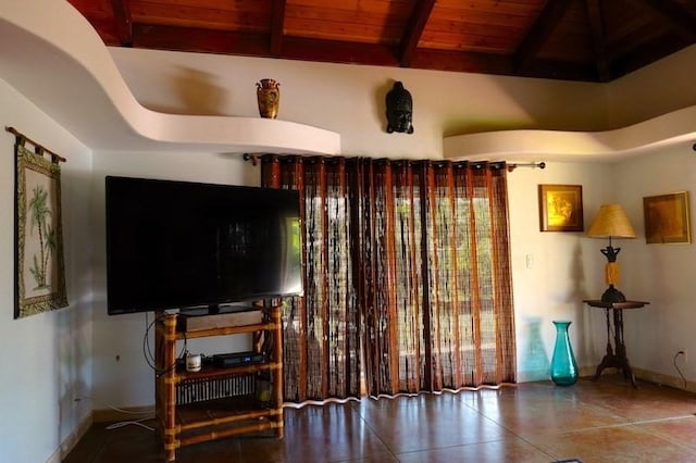 15-1050 Kiawe Rd, Keaau, HI 96749 - living area featuring wood ceiling with exposed beams, baseboards, and tile patterned flooring