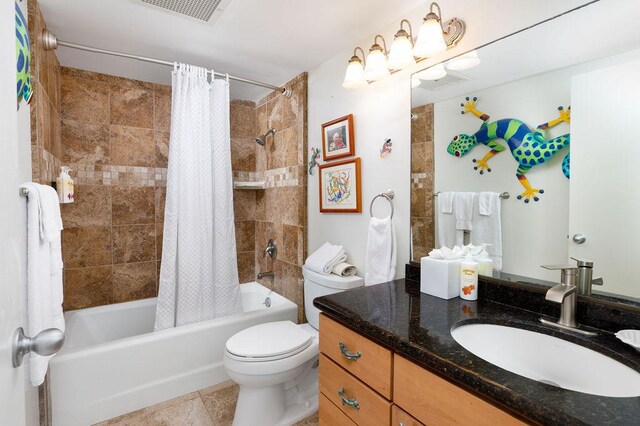 75-6106 Alii Dr Unit 311, Kailua-Kona, HI 96740 - bathroom featuring vanity, shower / bath combination with curtain, toilet, and tile patterned floors