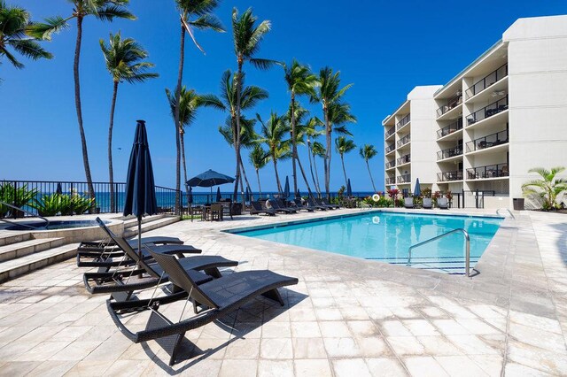 75-6106 Alii Dr Unit 311, Kailua-Kona, HI 96740 - community pool with a patio