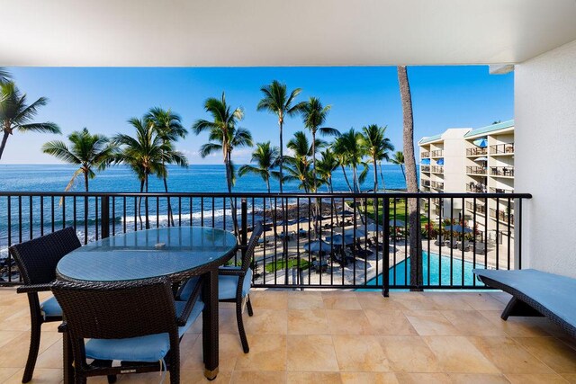 75-6106 Alii Dr Unit 311, Kailua-Kona, HI 96740 - balcony featuring a water view and view of pool area