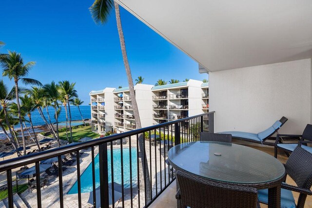75-6106 Alii Dr Unit 311, Kailua-Kona, HI 96740 - balcony with view of pool and a water view