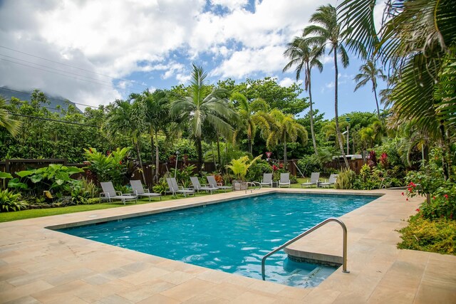5-7130 Kuhio Hwy Unit M1, Hanalei, HI 96714 - view of pool with a fenced backyard and a patio