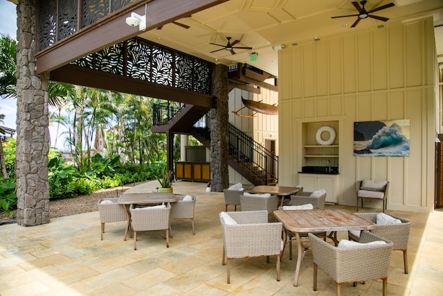 5-7130 Kuhio Hwy Unit M1, Hanalei, HI 96714 - view of patio / terrace with outdoor dining space, stairway, and ceiling fan