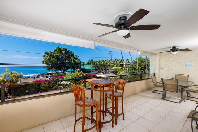 76-6225 Alii Dr Unit 105, Kailua-Kona, HI 96740 - balcony featuring a ceiling fan