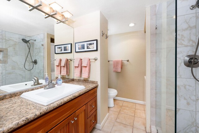76-6225 Alii Dr Unit 105, Kailua-Kona, HI 96740 - full bath featuring vanity, toilet, tiled shower, tile patterned floors, and baseboards
