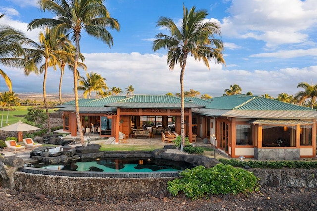 68-1000 Ke Kailani Dr, Kamuela, HI 96743 - back of property featuring a patio area and a swimming pool