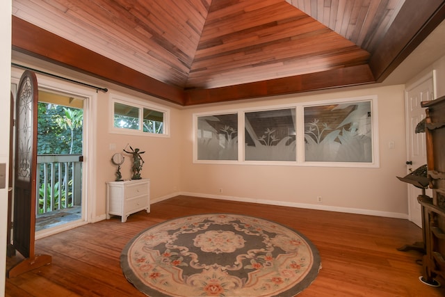 5841 Haaheo St, Kapaa, HI 96746 - foyer with wood finished floors, wooden ceiling, baseboards, a raised ceiling, and vaulted ceiling