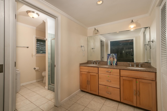 5841 Haaheo St, Kapaa, HI 96746 - bathroom featuring crown molding, tile patterned flooring, double vanity, toilet, and baseboards