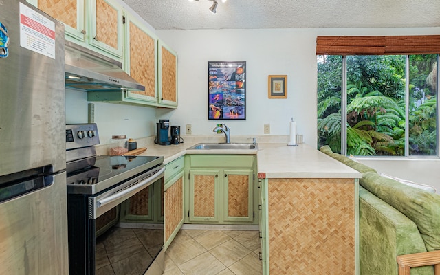 360 Kauila St Unit 201, Hilo, HI 96720 - kitchen featuring stainless steel appliances, a sink, a peninsula, under cabinet range hood, and light countertops