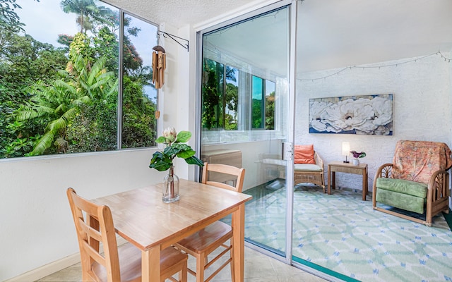360 Kauila St Unit 201, Hilo, HI 96720 - dining area with a textured ceiling