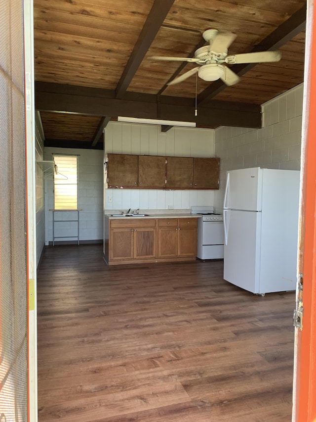 307 Lehua St Unit 22, Hilo, HI 96720 - kitchen featuring white appliances, wood ceiling with exposed beams, concrete block wall, dark wood finished floors, and a ceiling fan