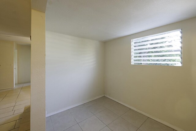 75-156 Lunapule Rd, Kailua-Kona, HI 96740 - unfurnished room featuring light tile patterned floors and baseboards