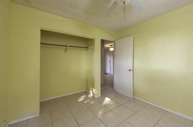 75-156 Lunapule Rd, Kailua-Kona, HI 96740 - unfurnished bedroom featuring light tile patterned floors, a closet, baseboards, and ceiling fan
