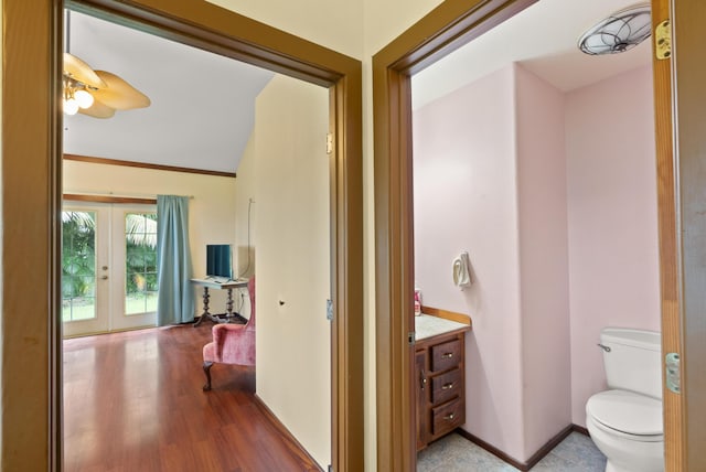 16-1700 34th Ave, Keaau, HI 96749 - bathroom with toilet, vanity, french doors, a ceiling fan, and vaulted ceiling
