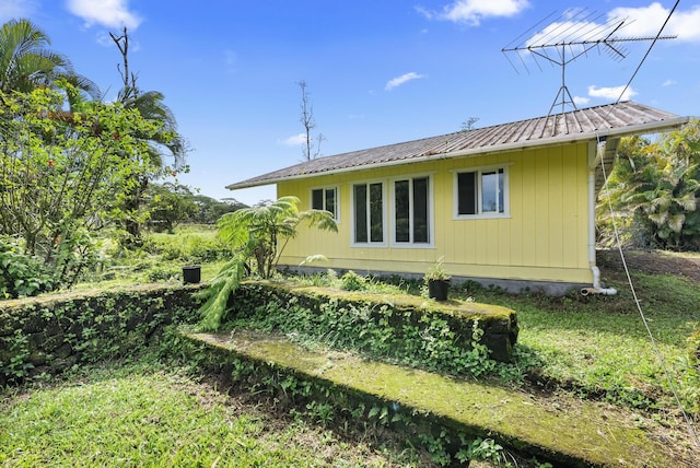 16-1700 34th Ave, Keaau, HI 96749 - view of side of property with metal roof