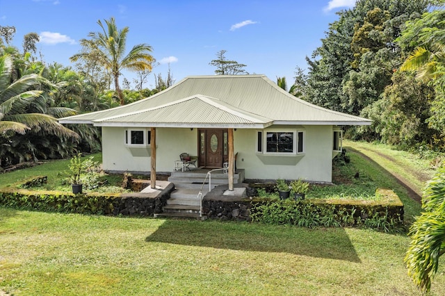 16-1700 34th Ave, Keaau, HI 96749 - bungalow-style home featuring covered porch, a front lawn, and stucco siding