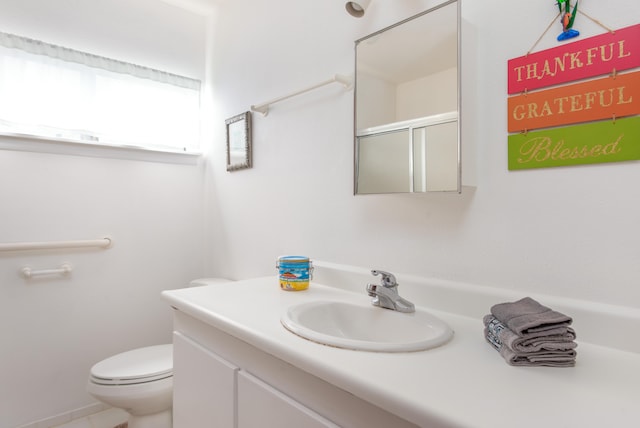 13-3638 Kumakahi St, Pahoa, HI 96778 - bathroom with vanity, toilet, and a shower with shower door