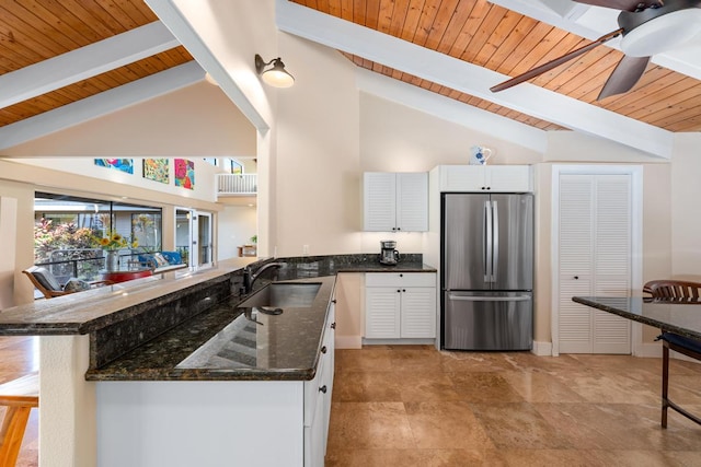 78-6881 Keaupuni St, Kailua-Kona, HI 96740 - kitchen with freestanding refrigerator, a sink, wooden ceiling with exposed beams, white cabinetry, and a ceiling fan