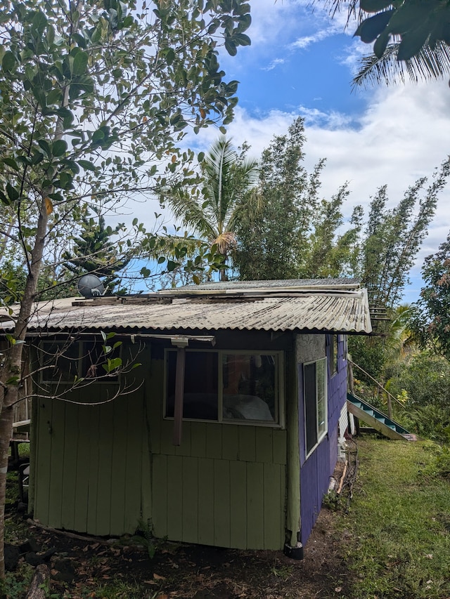 12-1114 Kaimu Makena Homestead Rd, Pahoa, HI 96778 - view of side of property with metal roof