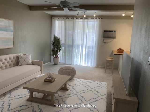 75-5873 Walua Rd Unit 118, Kailua-Kona, HI 96740 - carpeted living area featuring ceiling fan, a wall unit AC, and baseboards