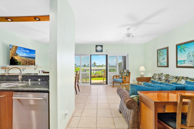 1568 Pee Rd Unit 211, Koloa, HI 96756 - living room featuring light tile patterned flooring and ceiling fan