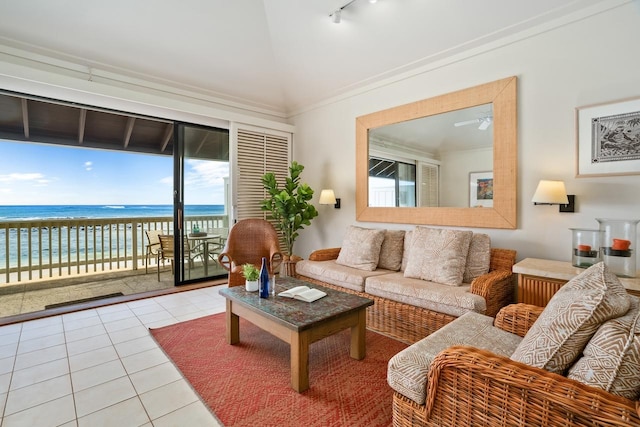 2253 Poipu Rd Unit 2, Koloa, HI 96756 - tiled living area featuring track lighting, lofted ceiling, plenty of natural light, ceiling fan, and a water view
