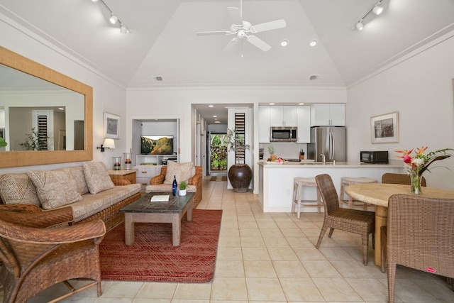 2253 Poipu Rd Unit 2, Koloa, HI 96756 - living area featuring rail lighting, high vaulted ceiling, light tile patterned floors, a ceiling fan, and ornamental molding