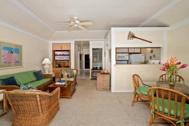 2253 Poipu Rd Unit 77, Koloa, HI 96756 - living area with light carpet, a ceiling fan, and crown molding