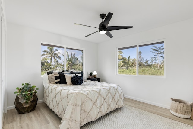 15-1499 23rd Ave, Keaau, HI 96749 - bedroom featuring wood finished floors, baseboards, and ceiling fan