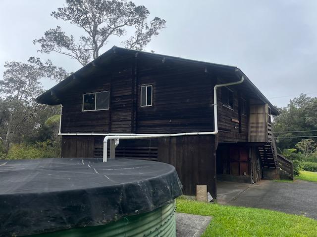 19-4142 Haunani Rd, Volcano, HI 96785 - view of property exterior with stairs