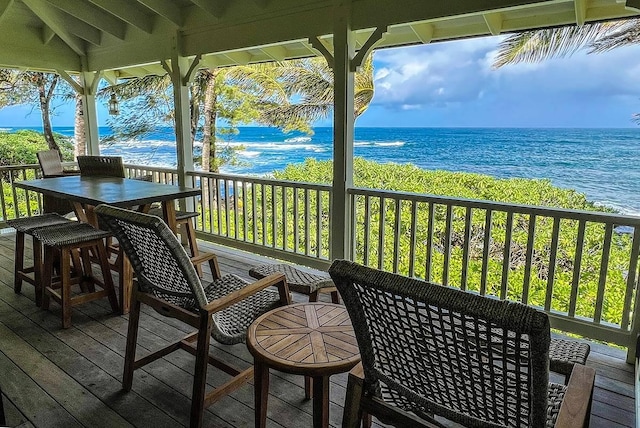 7324 Alealea Rd, Hanalei, HI 96714 - wooden terrace featuring a water view and outdoor dining area