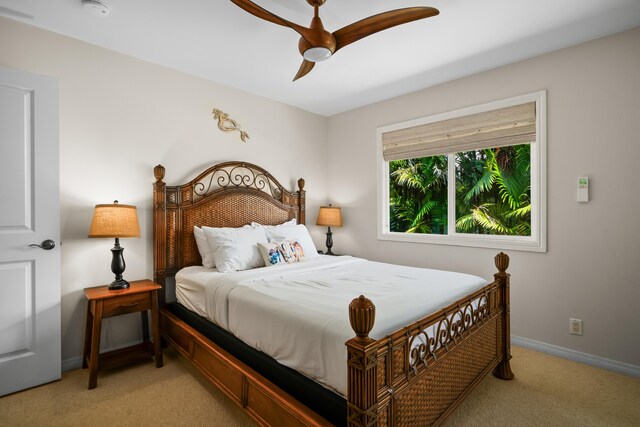 3675 Albert Rd, Princeville, HI 96722 - bedroom featuring light colored carpet and a ceiling fan