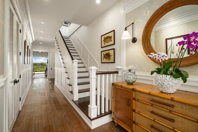 5086 Lau Nahele St, Koloa, HI 96756 - hall with a decorative wall, dark wood-style flooring, recessed lighting, stairway, and a wainscoted wall