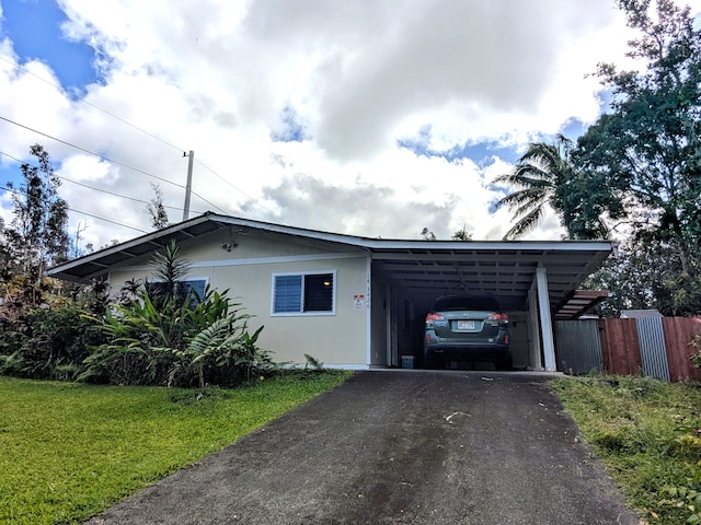 14-3426 Molokai Rd, Pahoa, HI 96778 - single story home with driveway and a carport