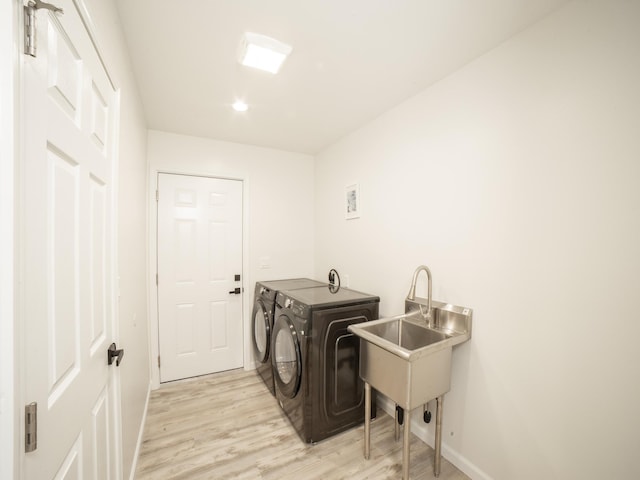 15-1703 5th Ave, Keaau, HI 96749 - laundry area featuring separate washer and dryer, light wood-style flooring, baseboards, and recessed lighting