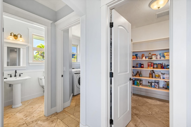 1167 Pua Melia St, Kalaheo, HI 96741 - storage area with washer / clothes dryer and a sink