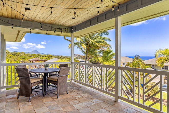 1167 Pua Melia St, Kalaheo, HI 96741 - view of patio featuring outdoor dining space and a mountain view