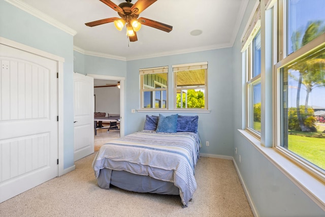 1167 Pua Melia St, Kalaheo, HI 96741 - bedroom with ornamental molding, carpet, ceiling fan, baseboards, and a closet