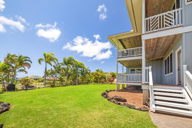 1167 Pua Melia St, Kalaheo, HI 96741 - view of green lawn featuring a balcony