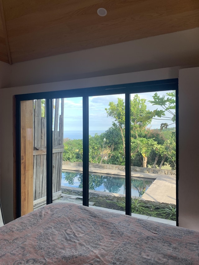 79-928 Mahiai Pl, Kealakekua, HI 96750 - bedroom featuring multiple windows and wood ceiling