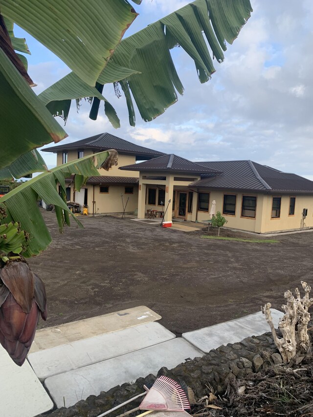 79-928 Mahiai Pl, Kealakekua, HI 96750 - view of front facade featuring stucco siding