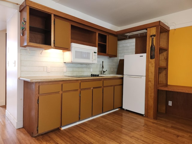 400 Hualani St Unit 3214, Hilo, HI 96720 - kitchen with open shelves, white appliances, decorative backsplash, light countertops, and wood finished floors