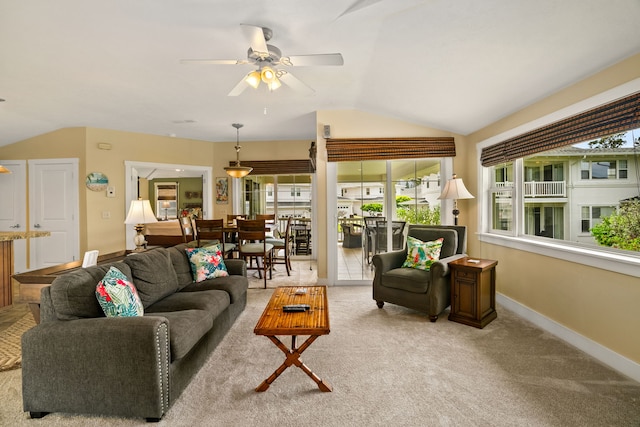 4771 Pepelani Lp Unit 1521, Princeville, HI 96722 - carpeted living area featuring lofted ceiling, ceiling fan, and baseboards