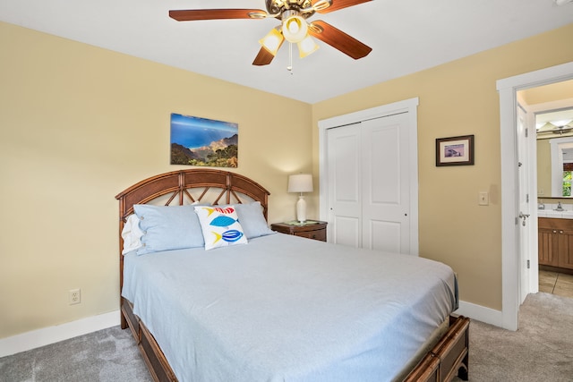 4771 Pepelani Lp Unit 1521, Princeville, HI 96722 - carpeted bedroom with a closet, baseboards, a ceiling fan, and a sink
