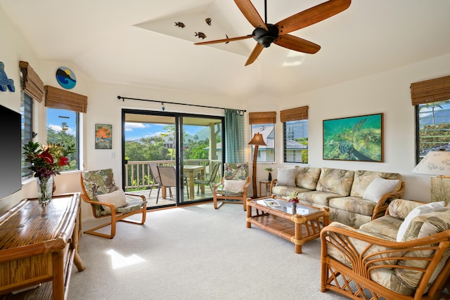 5451 Ka Haku Rd Unit 25, Princeville, HI 96722 - living room featuring a ceiling fan, carpet, and vaulted ceiling