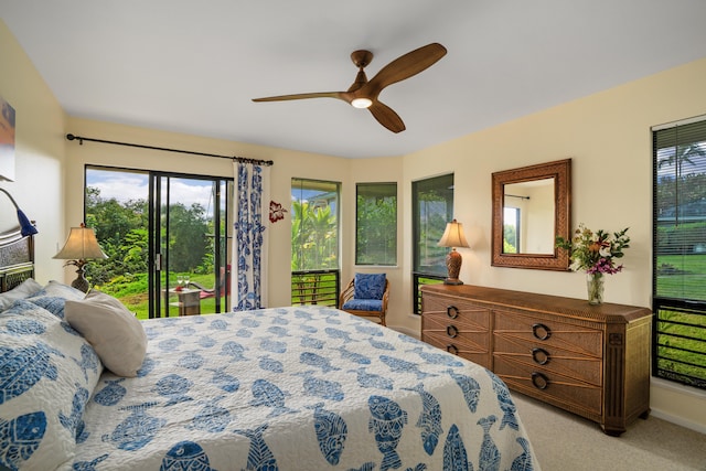 5451 Ka Haku Rd Unit 25, Princeville, HI 96722 - bedroom with access to exterior, multiple windows, light colored carpet, and ceiling fan